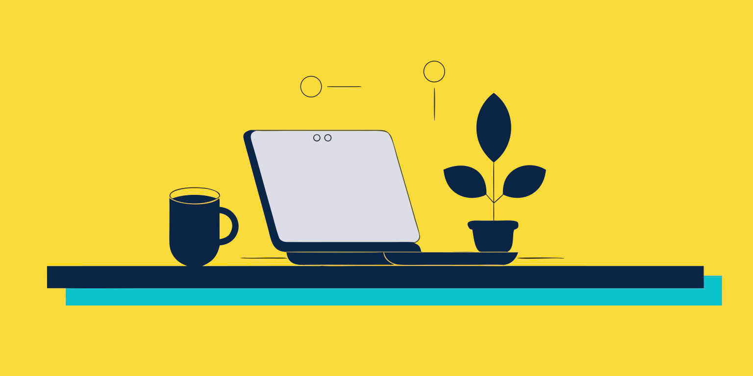 Laptop and coffee on a desk — remote work setup
